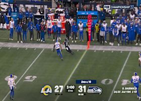 Sam Darnold locates Smith-Njigba on the run for 14-yard gain