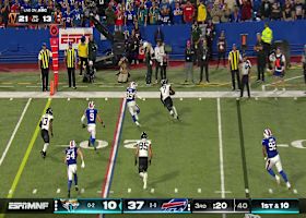 Brian Thomas Jr. muscles his way through the Bills' defense for 17 yards