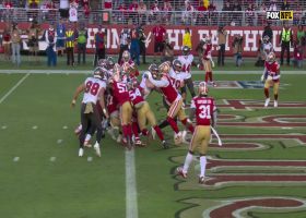 Rachaad White pushes his way across the goal line for a 1-yard TD