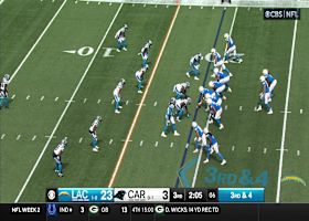 Justin Herbert slow to get up after absorbing Panthers' massive gang tackle on sack