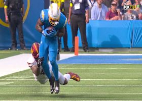 Omarion Hampton bulls his way through Frankie Luvu for 12-yard sideline pickup