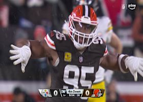 Myles Garrett drops Wilson to the turf for a sack on third down