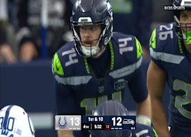 Smith-Njigba shakes a tackler on his way to a 39-yard gain