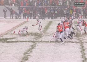 Snow-covered, slippery field conditions help D.J. Jones get TFL on Maye