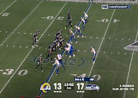 Rams D herd Darnold on third down for an 8-yard sack