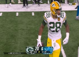 A.J. Dillon shows his hurdling skills on 22-yard gain