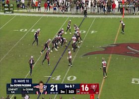 Drake Maye somehow evades sack to find Hollins down field for first down