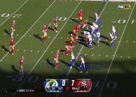 Wentz threads fourth-down laser in tight window to keep chains moving