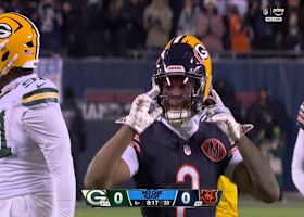 DJ Moore catches a 12-yard laser from Caleb Williams for a first down