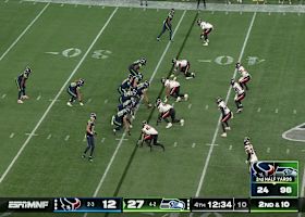 Kenneth Walker bursts through Texans defense for 16 yards