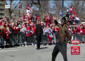 Willie Gay Jr. celebrates shirtless during Super Bowl LVIII victory parade