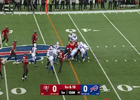 Rachaad White rumbles his way into Bills territory for 12-yard gain