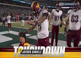 Jayden Daniels' first career playoff TD run trims Eagles' lead to 34-21