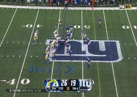 Bobby Okereke comes free on a blitz to drop Stafford for a sack