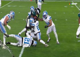 Tank Bigsby barrels through the Lions defense for a 17-yard gain