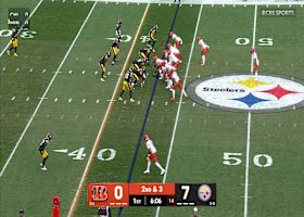 Chase Brown jukes his way through the Pittsburgh defense for 15-yard gain