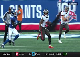 Bucky Irving roams the globe on 32-yard catch and run