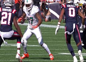 Tyler Huntley connects with a leaping Jaylen Waddle for a 20-yard gain