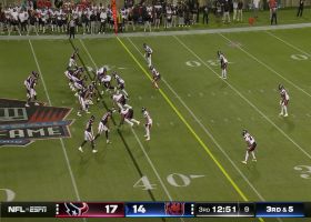 Rypien evades rush for ad-libbed throw to Brenden Bates for 27-yard gain