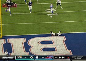 Roy Robertson-Harris blocks Bass' extra-point try after opening TD of Jags-Bills