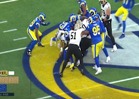 Landman lands a forceful punch to free the ball for Rams recovery