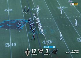 Carl Granderson tackles Chuba Hubbard short of first-down yardage