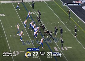 Stafford flicks a short pass to Nacua for a cheeky first-down conversion