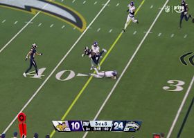 Keenan Allen somersaults over a Viking for a first down