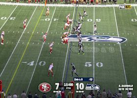 Sam Okuayinonu strips Smith-Njigba for a fourth-quarter turnover