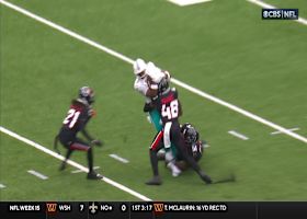 Jonnu Smith secures the catch through contact vs. Texans