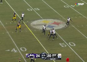 Calvin Austin spins off a Raven following a pass from Rodgers for 16 yards