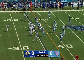 Higbee lurches 10 yards forward to secure a Rams' 1st down