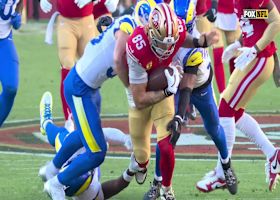 Kittle bulldozes Kinchens during 20-yard catch and run inside Rams' territory