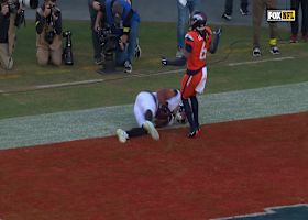 Brenton Strange dives to reel in a 3-yard TD pass from Lawrence vs. Broncos