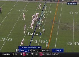 Allen stands up amongst pressure to find Diggs on third down