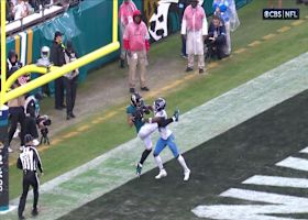 Parker Washington gets both feet down for TD grab in back of end zone