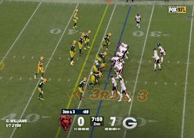 Williams rolls out to find Burden on third down