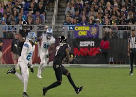 Lamar Jackson's 20-yard laser to Bateman fits into an airtight window across midfield