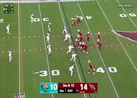 Michael Carter slips through a would-be tackle along sideline for 19-yard pickup