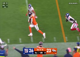 Evan Engram breaks a tackle and teeters the sideline for 18-yard gain to the red zone