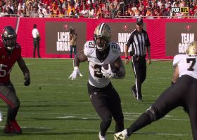 Jamaal Williams snags Carr's high loft for physical 12-yard catch and run on screen