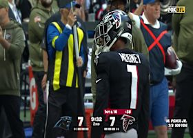 Darnell Mooney makes a 12-yard catch between Panthers defenders