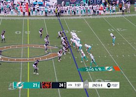 Quinn Ewers dots A.J. Henning for an 18-yard gain