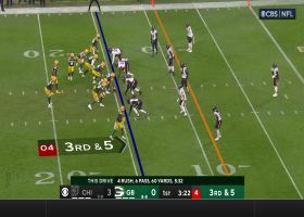 DeMarcus Walker rushes through Packer OL to bring down Love