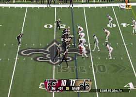 Alvin Kamara weaves through the Falcons defense for a 31-yard gain