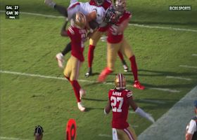 Lenoir lifts Otton into the air before dumping the TE to ground in slam-dunk fashion