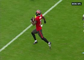 Bucky Irving accelerates after the catch to the doorstep of the end zone