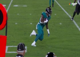 Lawrence's improvised shovel pass to Etienne moves chains on Jags' opening drive