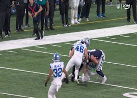 Jack Campbell's forceful punch frees the ball from Ferguson for a Lions recovery