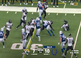 Taylor ducks, dodges, and spins forward for first down on 7-yard carry